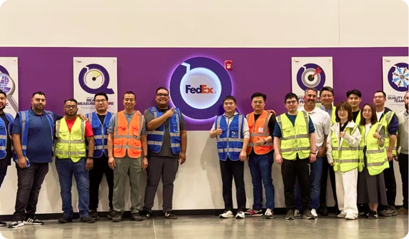 Lecangs team members visiting a FedEx facility
